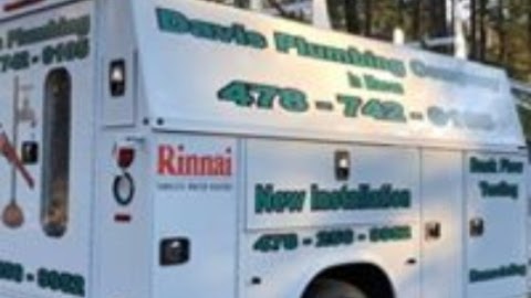 Close-up truck decal showing phone number and Rinnai tankless water heater branding